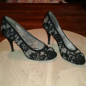 Stuart Weitzman black lace pumps